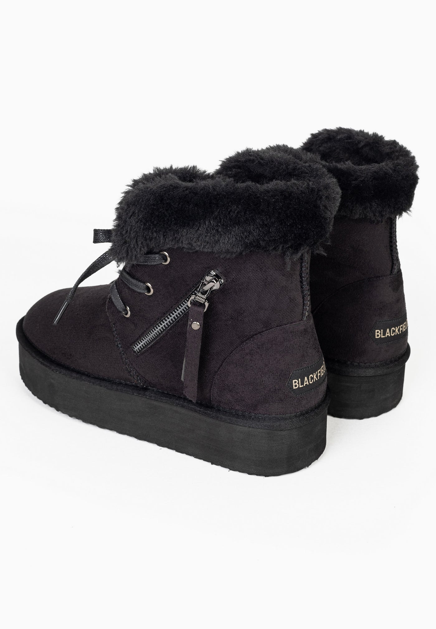 Paire de bottines fourrées Celia noires de dos, cols épais et plateformes noires