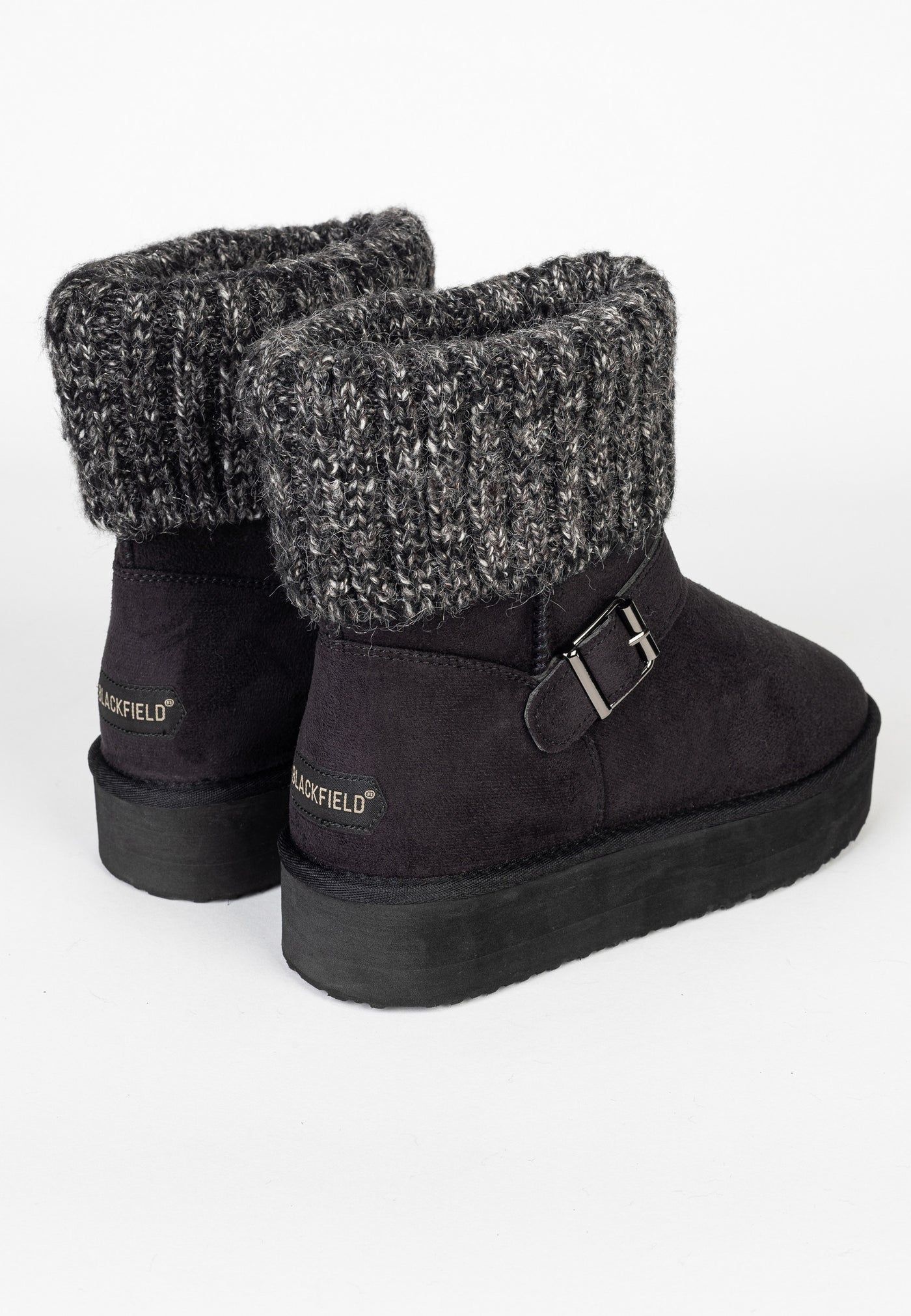 Bottines fourrées Kylie noires vues de trois-quarts arrière, marquage doré au talon