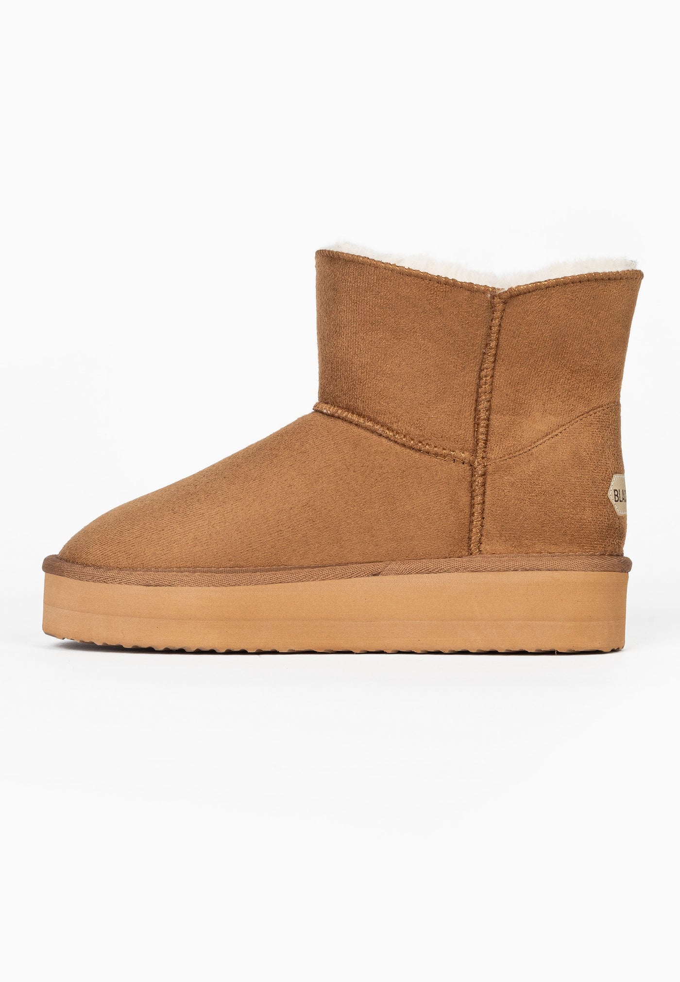 Bottine fourrée Curry camel de profil intérieur, petite étiquette au talon