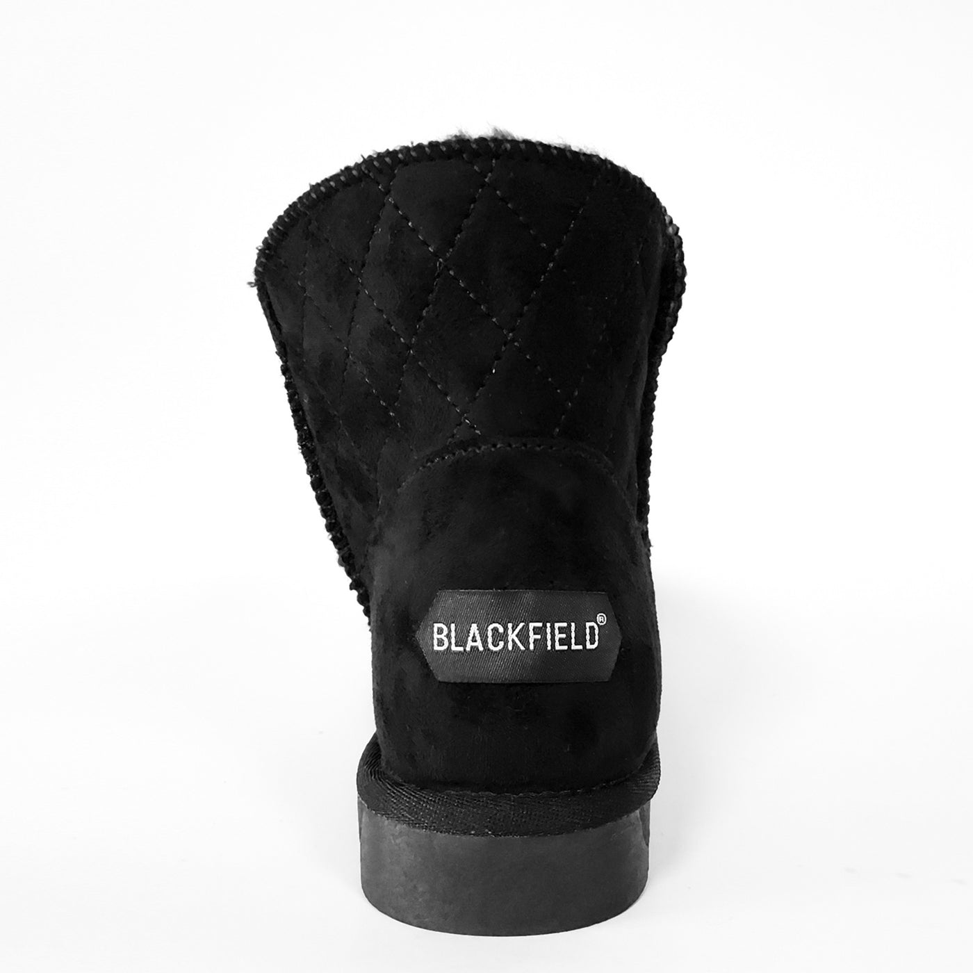 Bottine fourrée Choup noire de dos, étiquette Blackfield blanche cousue au talon