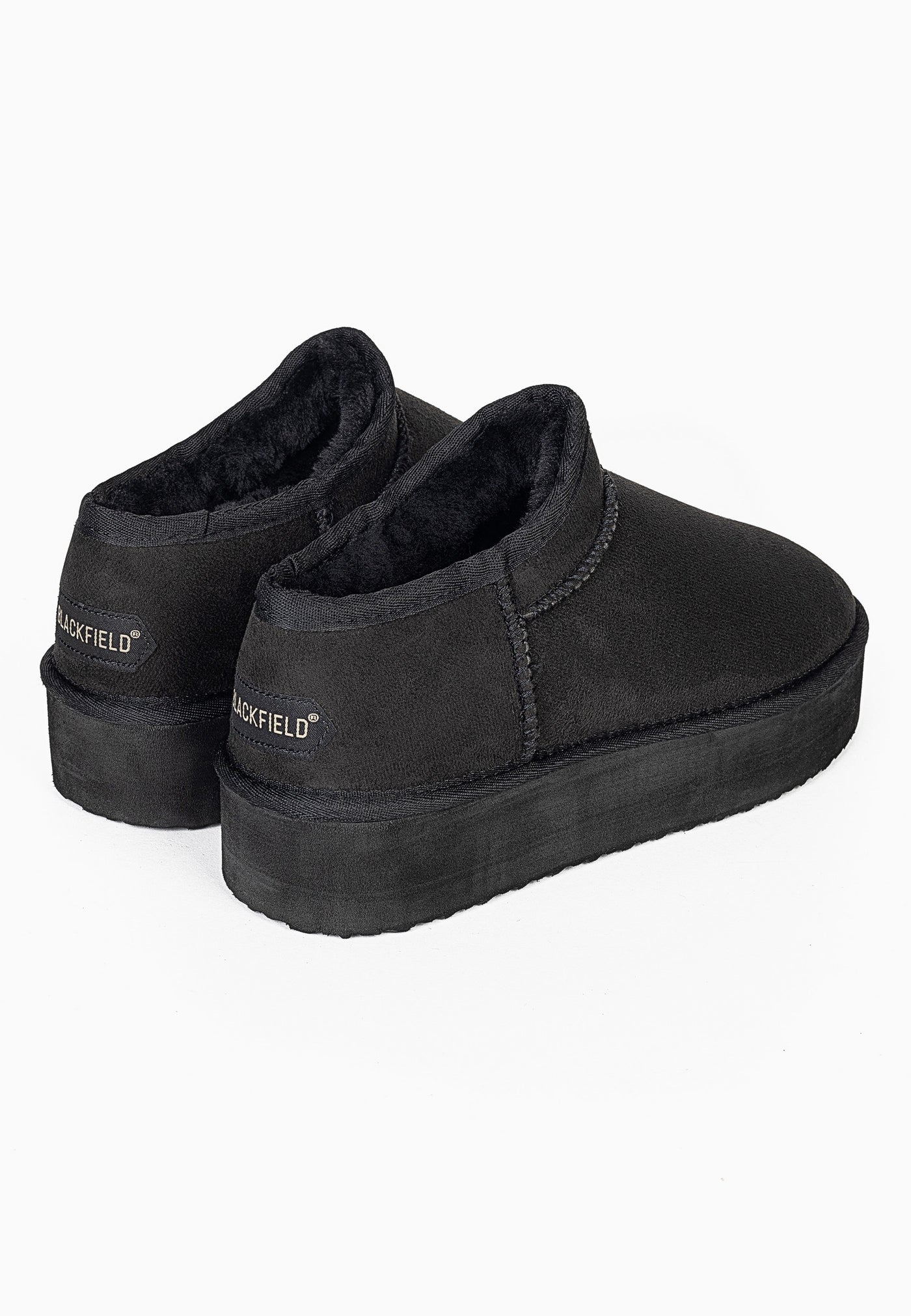 Deux bottines fourrées Fiaza noires vues de dos, doublure sombre au col