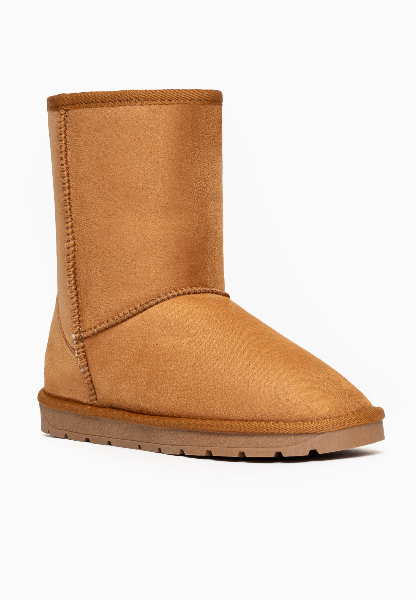 Botte fourrée Joy camel de profil, arc de couture au-dessus des orteils