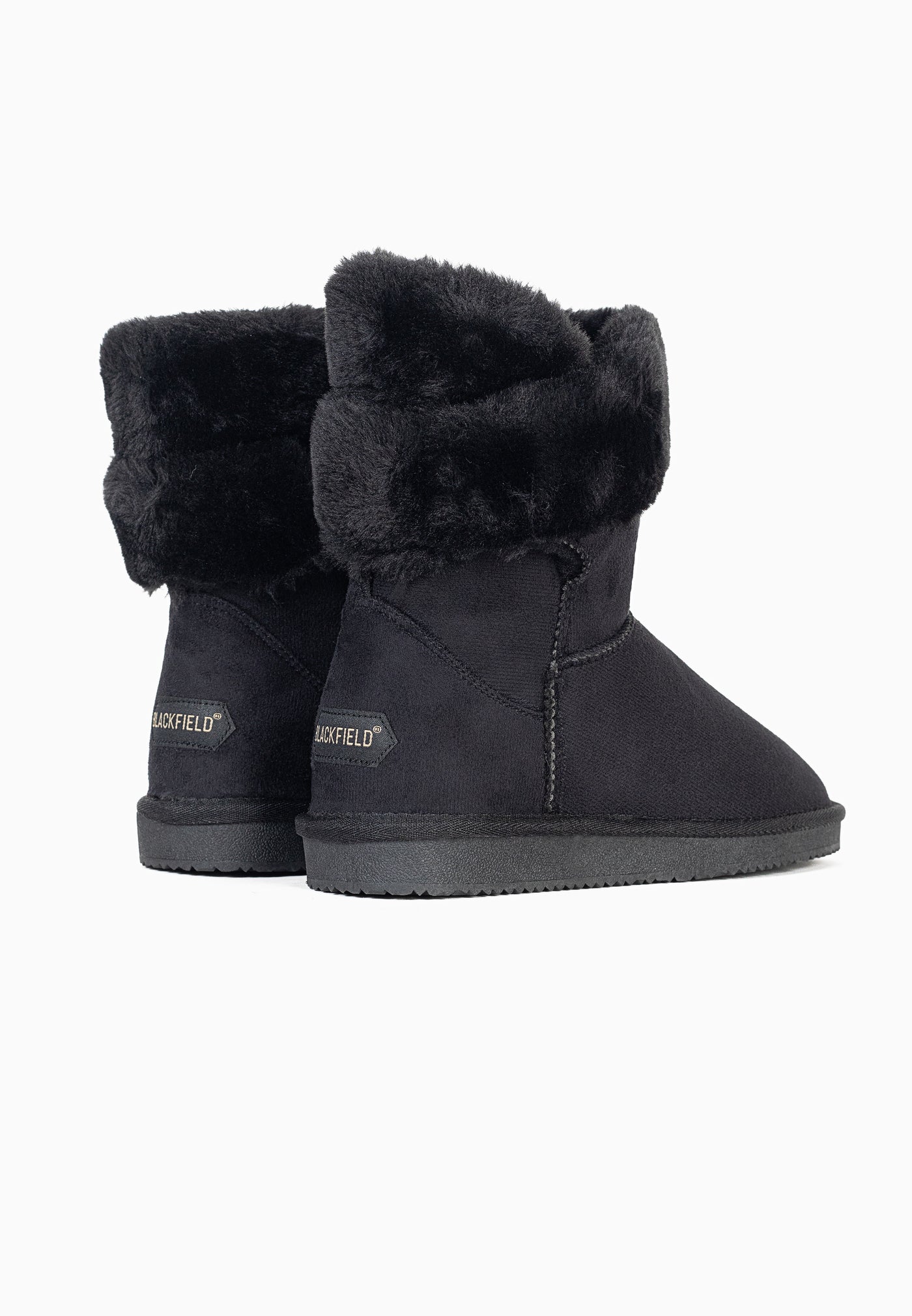 Paire de bottines fourrées Barbara noires de dos, deux étiquettes dorées aux talons