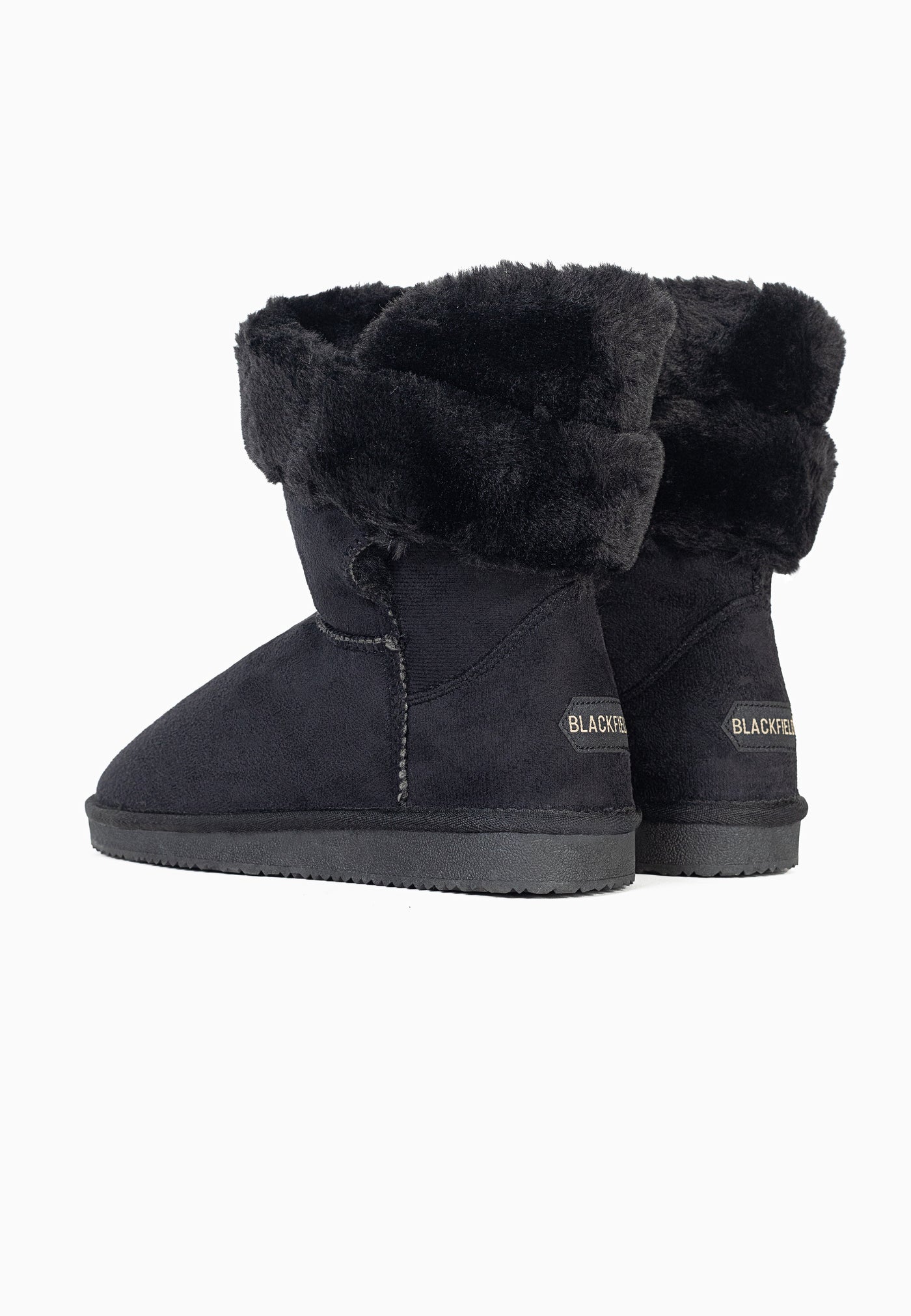 Bottines fourrées Barbara noires vues de dos, revers relevés et talons alignés