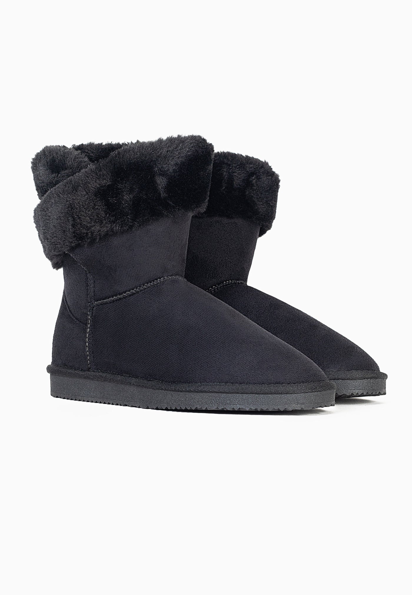 Deux bottines fourrées Barbara noires de trois-quarts, revers noirs rabattus
